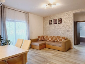 Langa statie autobuz si Profi. Incalzire in pardoseala. Loc de parcare. - imagine 2