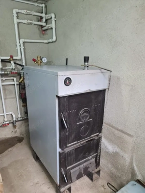 Vând centrală din fontă 32kw 