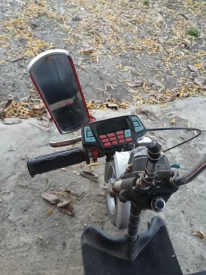 scuter electric pe trei roti