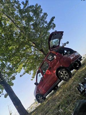 Suzuki ignis 2007 4x4 - imagine 2