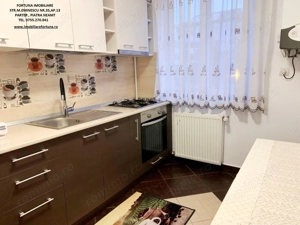 Apartament 2 camere,elegant,mobilat si utilat,etaj1, zona Ultracentrala- P-ta M.Kogalniceanu - imagine 7