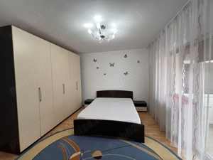 Închiriez apartament frumos și spațios. - imagine 7