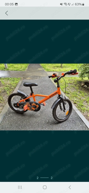 Vând bicicletă portocalie 4-6 ani,în stare f bună.