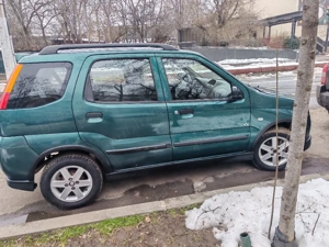 Suzuki ignis 2006 - imagine 4