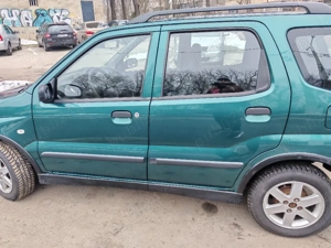 Suzuki ignis 2006 - imagine 3