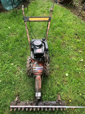 Motocoasa cu masa de taiere