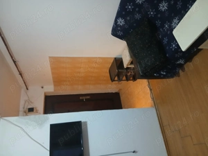 Vând Garsoniera în Bals județul Olt catanga etajul 4 vedere pe față scara 2 are gaze 