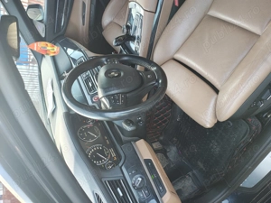 BMW seria 7 f01 2009 euro 6 - imagine 4