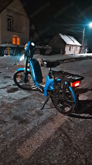 vâd sau schimb Bicicleta eletrica 45km nu tine bateria mult în carcata preț mic 