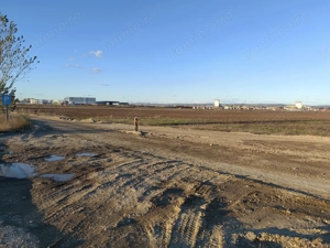 Vand teren extravilan langa sediul UMB potential industrial excelent
