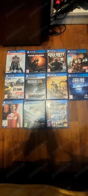 PS 4 slim + cabluri necesare +11 jocuri + 2 console