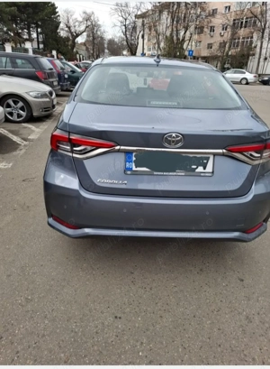 Vand Toyota Corolla Sedan Business MT IMPECABILA - imagine 8