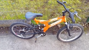 Bicicleta cu roti pe 20 suspensie fata spate  