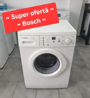 Mașină de spălat rufe automată Bosch. 