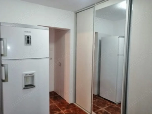 Vând apartament 2  camere + locație cu 2 spații comerciale în Berești - imagine 2