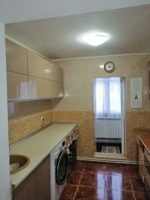 Vând apartament 2  camere + locație cu 2 spații comerciale în Berești - imagine 10