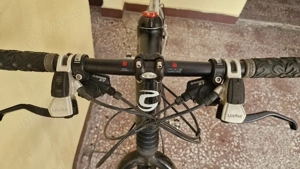 vând bicicletă Cannondale optimo