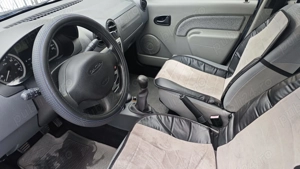 Vând Logan 1.4 MPI Laureate, 130.700 km, bine întreținut, unic proprietar - imagine 4