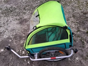 vănd cărucior copii care se atașeazăde bicicleta