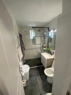 Închiriez apartament cu 2 camere - imagine 2