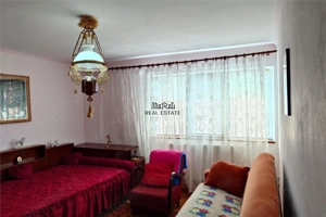 Gospodarie cu teren generos si constructii solide intr-o zona linistita - imagine 8