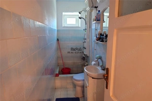 Gospodarie cu teren generos si constructii solide intr-o zona linistita - imagine 11