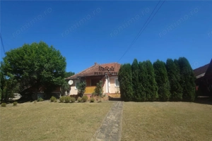 Gospodarie cu teren generos si constructii solide intr-o zona linistita - imagine 18