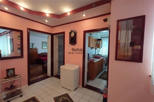 Gospodarie cu teren generos si constructii solide intr-o zona linistita - imagine 4