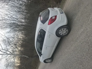 Opel Corsa D 1.4 benzina  - imagine 4