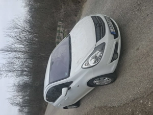 Opel Corsa D 1.4 benzina  - imagine 2