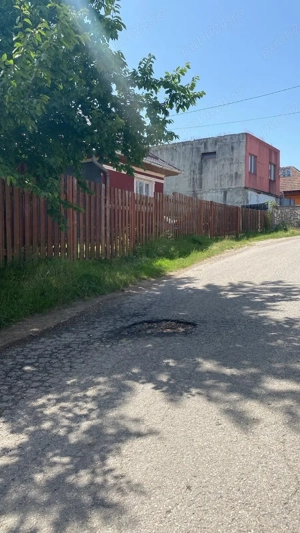 teren intravilan Corusu 1483 mp cu casa batraneasca 2 camere, sau 750 mp