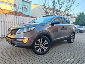 Kia Sportage Diesel Euro5 NaviPieleXenonPanoramicINczScaune BanchetaKeyLesGoClimatronicCmrMasalier 