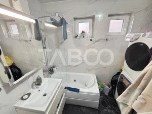 De vanzare apartament 3 camere decomandate parter inalt peste garaje - imagine 7