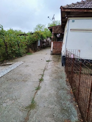 Casă din lemn cu anexe din cărămidă - Lăcușteni Vâlcea - imagine 2