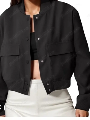 jachetă de damă tip bomber, cu o croială scurtă (crop) .