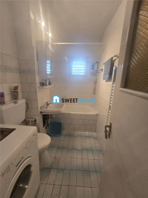 Apartament cu trei camere in zona centrala