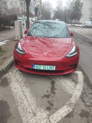 Tesla model 3, standard range + - imagine 7