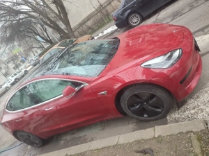 Tesla model 3, standard range + - imagine 4