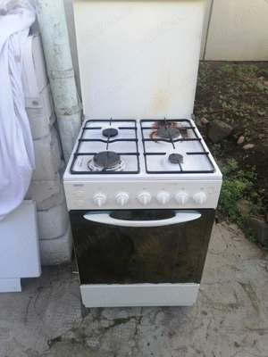 Vind aragaz cu patru ochiuri și cuptor Zanusi 