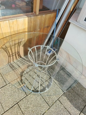 Masa rotunda de sticlă 