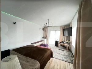 Casă spațioasă în zona Tulbureni cu teren de 1400 mp - imagine 2
