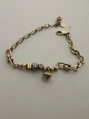 Bratara aur tip Pandora model deosebit 14k persoana fizica