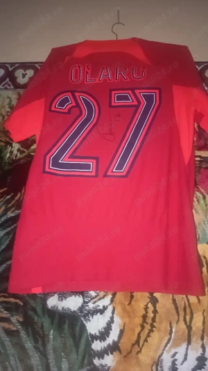 se vinde tricou  original  semnat de Darius Olaru 