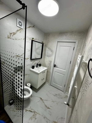  Apartament 2 camere – renovat complet – Țiglina 1 ,parter - imagine 5