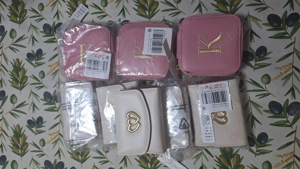 Portofele damă și cutie de bijuterii 