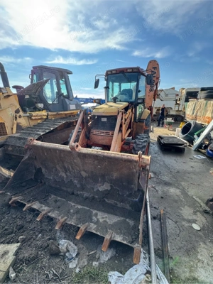 Buldoexcavator Komatsu Fai 898