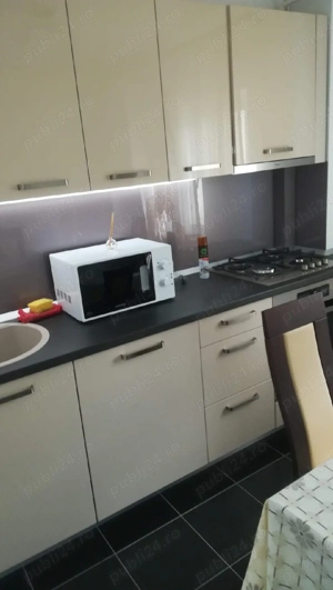 închiriez ap central 2 camere lux 