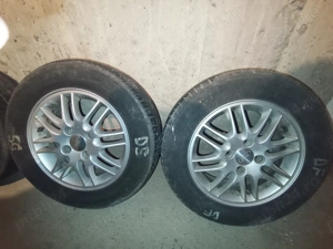 Vând 4 jante Aliaj R15 în 16 spițe echipate cu anvelope de Vară 195/65/R15, prindere 4X108.  - imagine 3