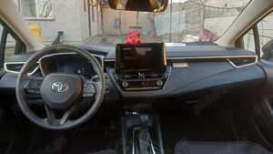 Vind sau schimb Toyota corolla 1,8 benzina -hybryd cumparata noua ,proprietar an 2025  - imagine 9