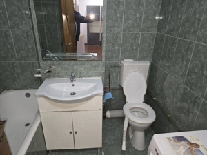 Garsoniera moderna transformata in doua camere in Gavana   Lumina - imagine 9